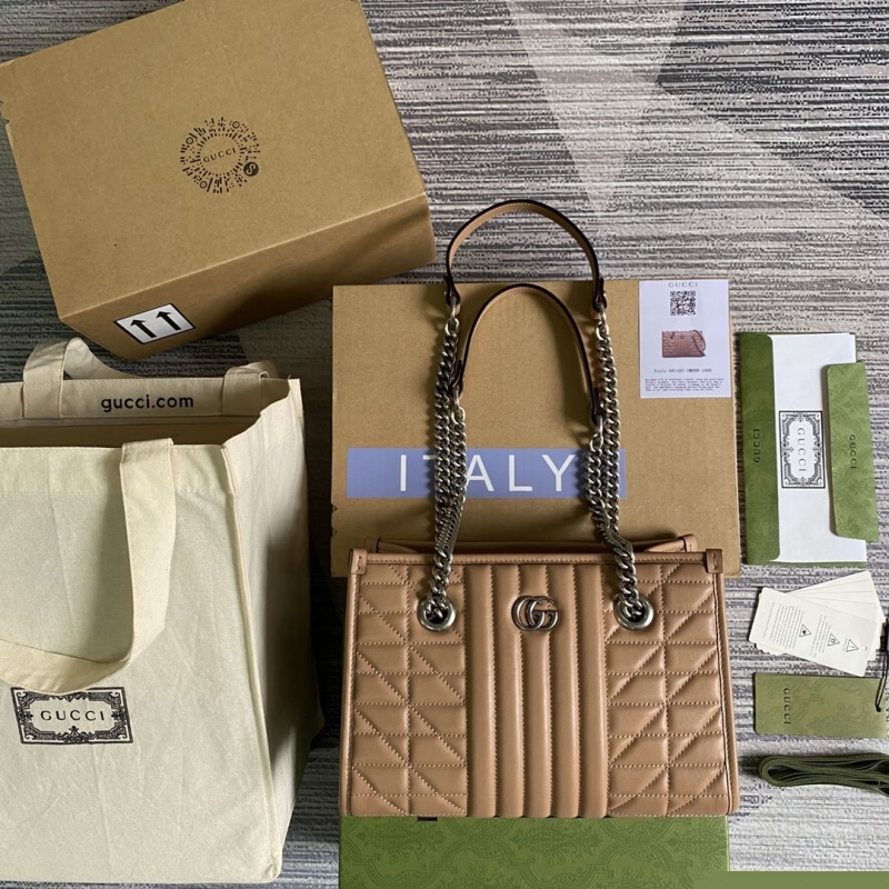 G*u*i shopping bags